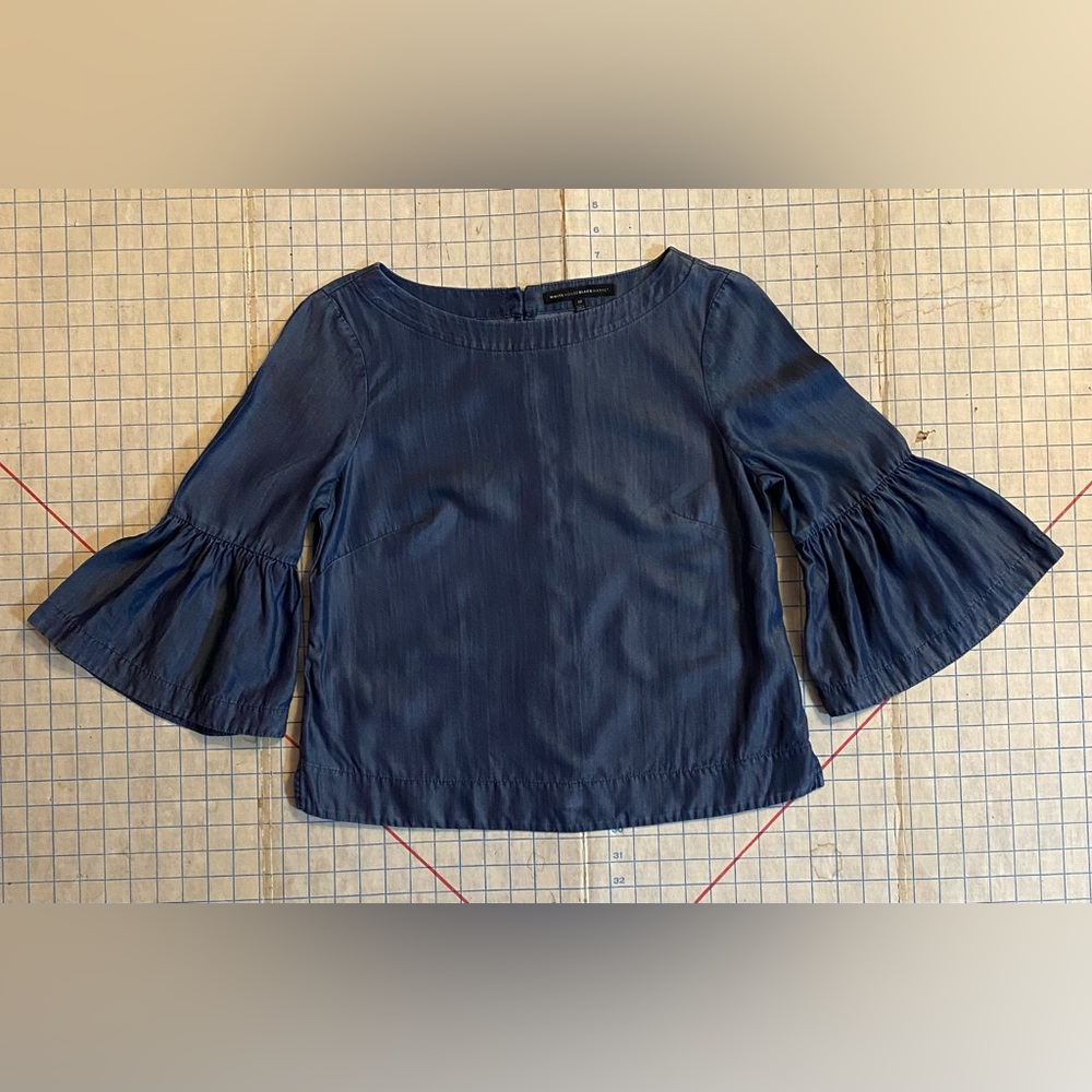 White House Black Market Denim Blouse. Size 10 top, 3/4 ruffle sleeves